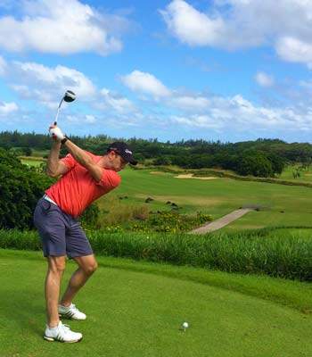 Stuart teeing off on the Heritage Golf Course in Mauritius